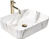 A white marble-patterned sink with a gold faucet. Produktbild-Vorschau