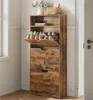A shoe cabinet with shoes on display, placed in a room corner near a window and a door. Produktbild-Vorschau