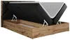 A boxspring bed with its mattress lifted to reveal storage space underneath. Produktbild-Vorschau