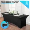 A black tablecloth is draped over a table set for a meal, with a floral centerpiece. Produktbild-Vorschau