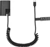 A black dummy battery coupler with a coiled USB-C power cable. Produktbild-Vorschau