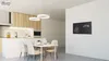 A modern kitchen and dining area with a chalkboard mounted on the wall. Podgląd zdjęcia produktu