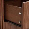 A close-up view of an open drawer in a wooden dresser. Podgląd zdjęcia produktu