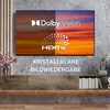 A television screen displaying HDR content, with text overlays highlighting features. Produktbild-Vorschau