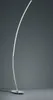 A modern, curved floor lamp on a plain gray background. Náhled obrázku produktu