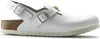 A white Birkenstock Tokio sandal with a cork sole and adjustable straps, shown from a side view against a white background. Produktbild-Vorschau