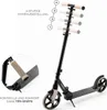 A scooter is shown with callouts highlighting its features. Náhled obrázku produktu