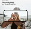 A young girl blowing bubbles on a beach, viewed through a smartphone screen. Anteprima dell’immagine prodotto