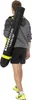 A person carrying a black and yellow bag over their shoulder. Produktbild-Vorschau