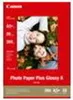 A package of Canon photo paper with an image of two children lying down. Podgląd zdjęcia produktu