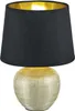 A table lamp with a black shade and a textured gold base. Náhled obrázku produktu