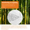A close-up of a pillow filling with a background of bamboo stalks. Produktbild-Vorschau