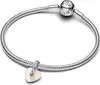 A silver Pandora bracelet with a heart-shaped charm. Podgląd zdjęcia produktu