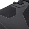 A close-up view of the toe area of a black shoe, showing the texture and stitching. Produktbild-Vorschau