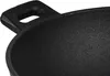A close-up view of the handle and inner surface of a black cast iron wok grill pan. Podgląd zdjęcia produktu