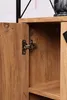 A close-up view of an open cabinet door with a hinge. Produktbild-Vorschau