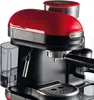 A close-up view of a red and black espresso machine. Produktbild-Vorschau