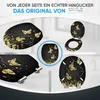 A collage of images showcasing a black toilet seat with a gold butterfly and grass design, presented from different angles and perspectives. Produktbild-Vorschau