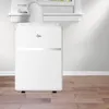 A white portable air conditioner with a hose connected to a window. Produktbild-Vorschau