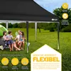 A family is sitting under a black pop-up gazebo in a grassy field. Anteprima dell’immagine prodotto
