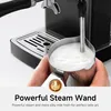 Close-up of a person using a steam wand on an espresso machine to froth milk. Produktbild-Vorschau