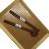 Wiederverwendbare Sushi-Essstäbchen aus dunklem Holz Produktbild-Vorschau 9