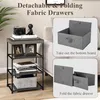 A side table with fabric drawers and instructional graphics showing how to assemble them. Podgląd zdjęcia produktu