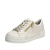 A single beige sneaker with a platform sole and a gold zipper is shown against a white background. Náhled obrázku produktu
