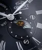 Close-up of a watch face showing the sun and moon complication. Podgląd zdjęcia produktu