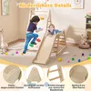 Children playing on a wooden climbing structure indoors, with colorful balls scattered around. Produktbild-Vorschau