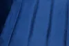 A close-up view of a blue velvet fabric with stitched lines. Produktbild-Vorschau