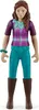 A toy figurine of a girl standing. Voir les images du produit