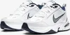 A pair of white Nike Air Monarch IV sneakers with navy blue accents. Náhled obrázku produktu