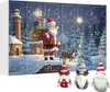 A Christmas advent calendar with numbered doors depicting a winter scene with Santa Claus, a lighthouse, and a reindeer. Three gnome plush toys are in the foreground. Produktbild-Vorschau