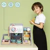 A child is playing with a toy coffee and ice cream bar. Anteprima dell’immagine prodotto