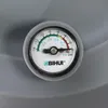 A close-up of a pressure gauge on a gray surface. Produktbild-Vorschau