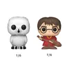 Two Funko Pop! figures, one of a white owl and the other of Harry Potter holding a broomstick, are displayed against a white background. Anteprima dell’immagine prodotto