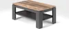 A modern coffee table with a wood-look top and gray base, shown in a studio setting. Podgląd zdjęcia produktu