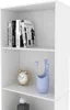 Close-up view of a white bookshelf with books, a clock, and a vase. Produktbild-Vorschau