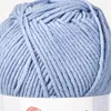 A close-up view of a ball of light blue yarn. Podgląd zdjęcia produktu