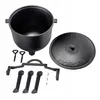 A black cast iron pot with a lid and accessories, laid out on a white background. Podgląd zdjęcia produktu