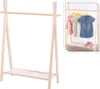 A wooden children's clothes rack with a shelf and clothes hanging on it, shown in a separate inset image. Produktbild-Vorschau
