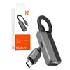 The image shows the packaging and the product itself, a Mcdodo USB-C to USB-C & USB-A adapter. Náhľad obrázku produktu