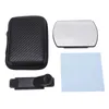 A flat lay of a phone camera accessory kit on a white background. Voir les images du produit