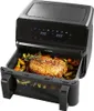 A black air fryer with a roast and vegetables inside, displayed on a white background. Produktbild-Vorschau