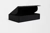 A black cardboard box with its lid open, shown against a white background. Podgląd zdjęcia produktu