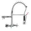 A chrome kitchen faucet with a pull-down sprayer and two handles for hot and cold water, mounted on a white background. Podgląd zdjęcia produktu