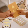Hands of an adult and a child interacting with learning cards. Produktbild-Vorschau