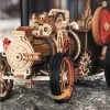 A close-up view of a detailed wooden model of a steam engine. Produktbild-Vorschau