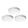 Three white smoke detectors are arranged in a triangular formation against a white background. Produktbild-Vorschau